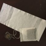 A Finum tea bag and normal sized one.
