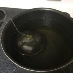 My tea ball in a pot of water.